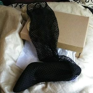 Knee high fishnet heels